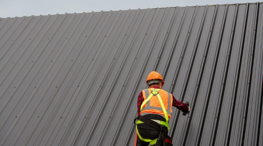 Professional metal roof installation services in Fairburn, SD